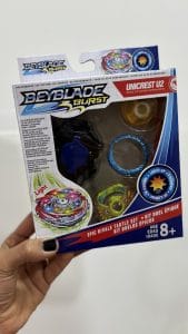 Beyblade trompo luminoso con lanzador